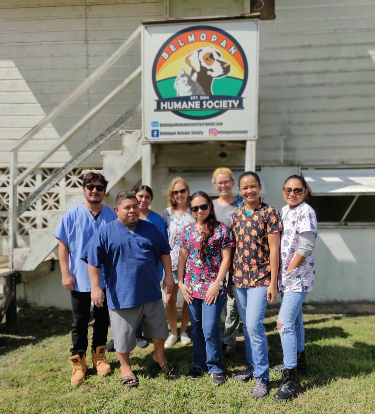 Members of Belmopan Humane Society, standing infront of the BHS Center in Belmopan